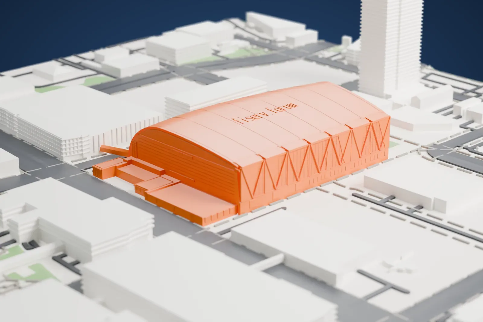 A white 3D print of Fiserv Forum, an arena with a long arched roof carrying the stylized name fiserv.forum, set among downtown streets and buildings.