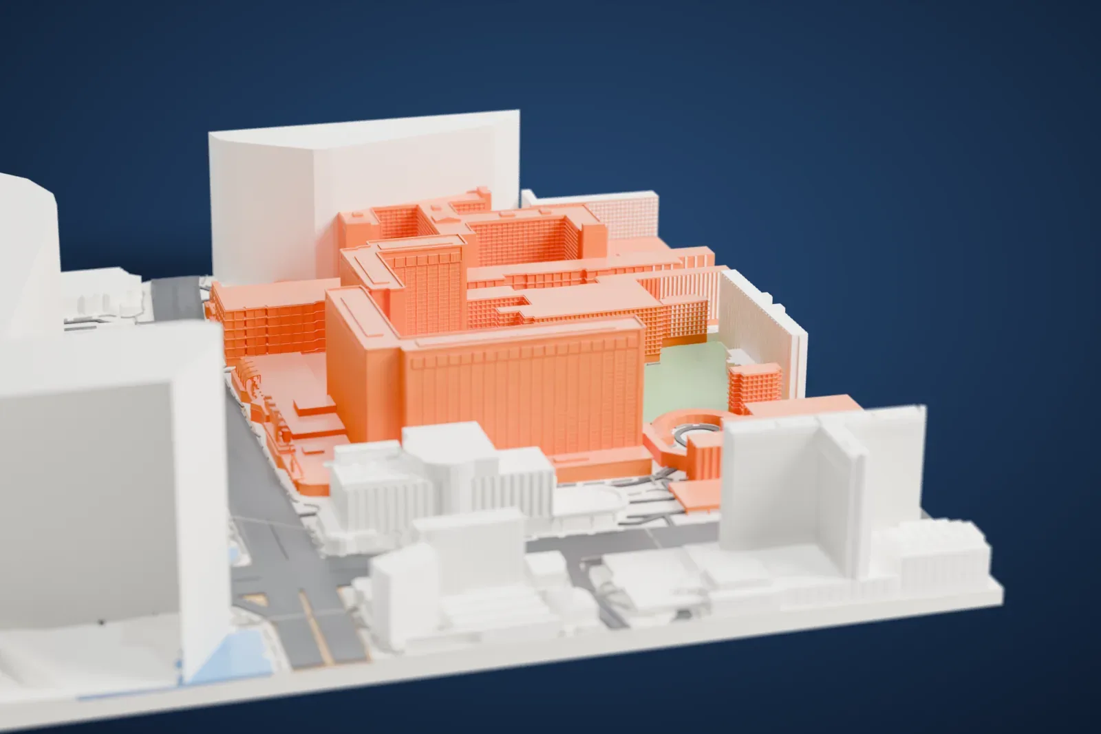 A white 3D print of Flamingo Las Vegas, a group of tall hotel blocks on a low base beside a garden courtyard, with wide roads and other buildings around it.