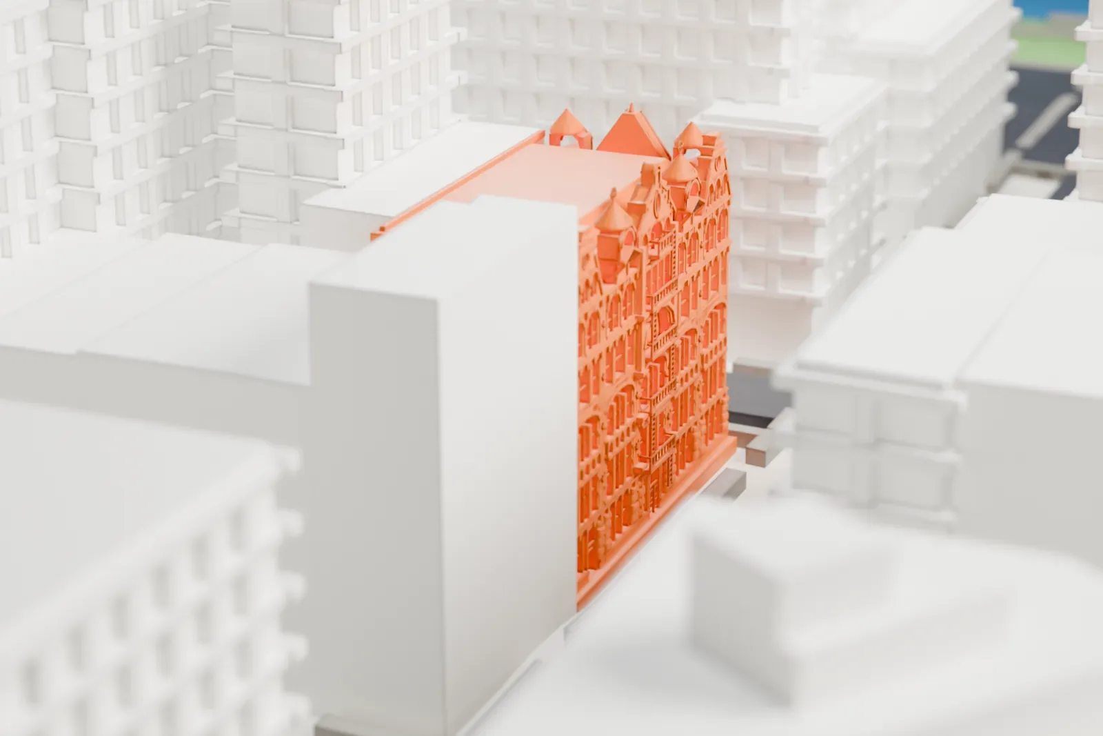 A white 3D print of the Fleming Smith Warehouse, a small building set among taller buildings on a Tribeca street grid.