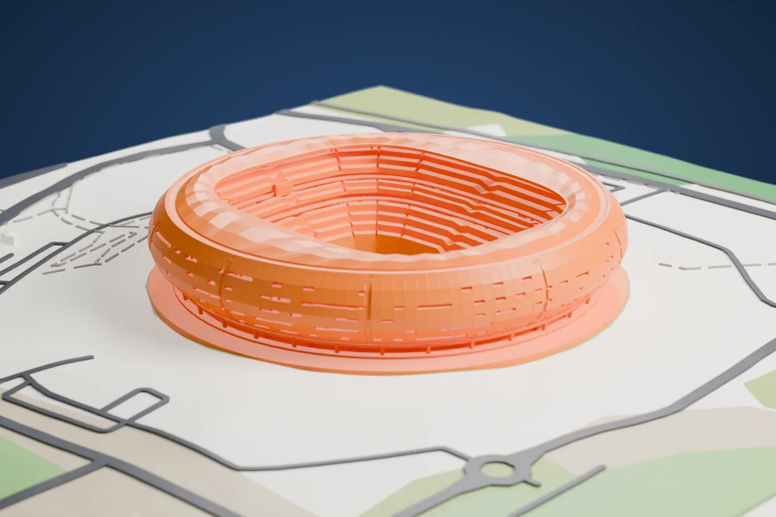 A white 3D print of FNB Stadium, a round bowl with tiered stands inside a wide roof ring, standing on open ground with roads, roundabouts and a few small buildings around it.