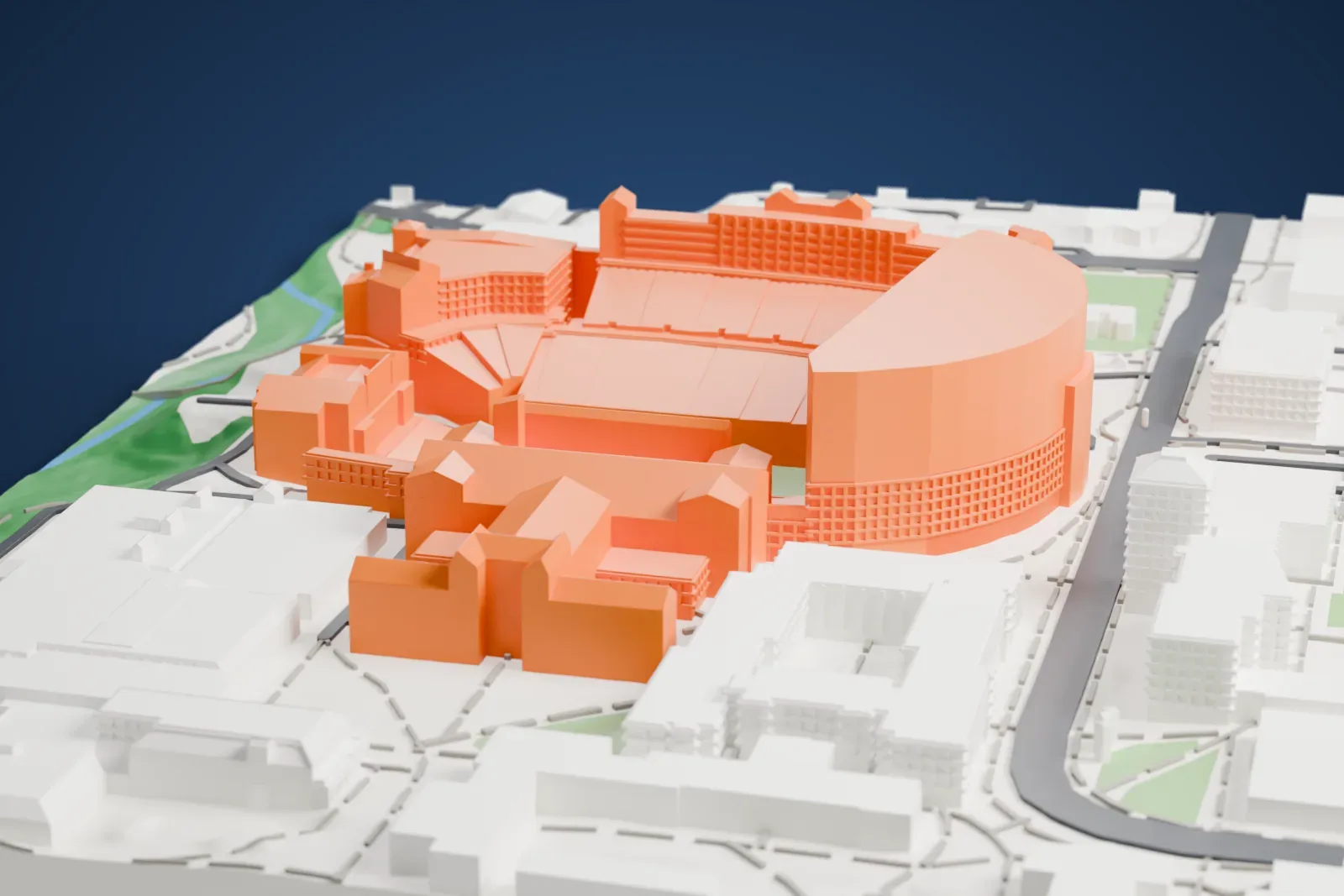 A white 3D print of Folsom Field, a horseshoe-shaped stadium with sloping seating rows and a facade of arches and small towers, surrounded by buildings, roads and green lawns.