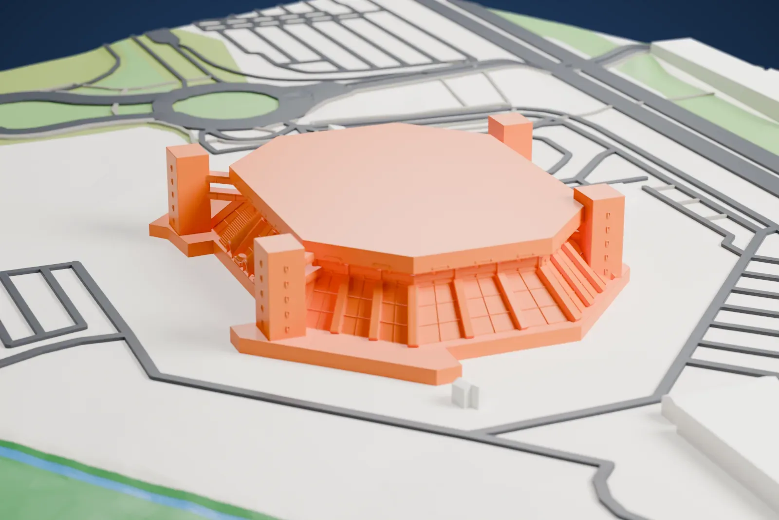 A white 3D print of the Forum di Milano, a low, wide arena, among the surrounding streets and buildings of its suburb.