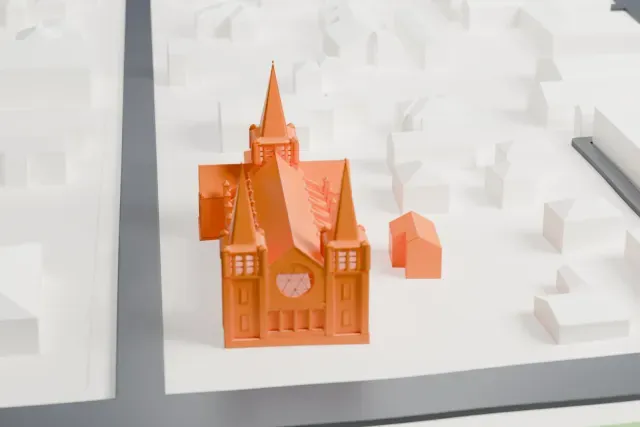 A white 3D print of the Free Church of Tonga model in Nukuʻalofa, with the streets around it.