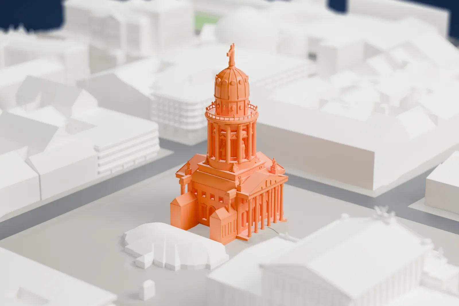 A white 3D print of the French Cathedral among the surrounding streets and buildings.