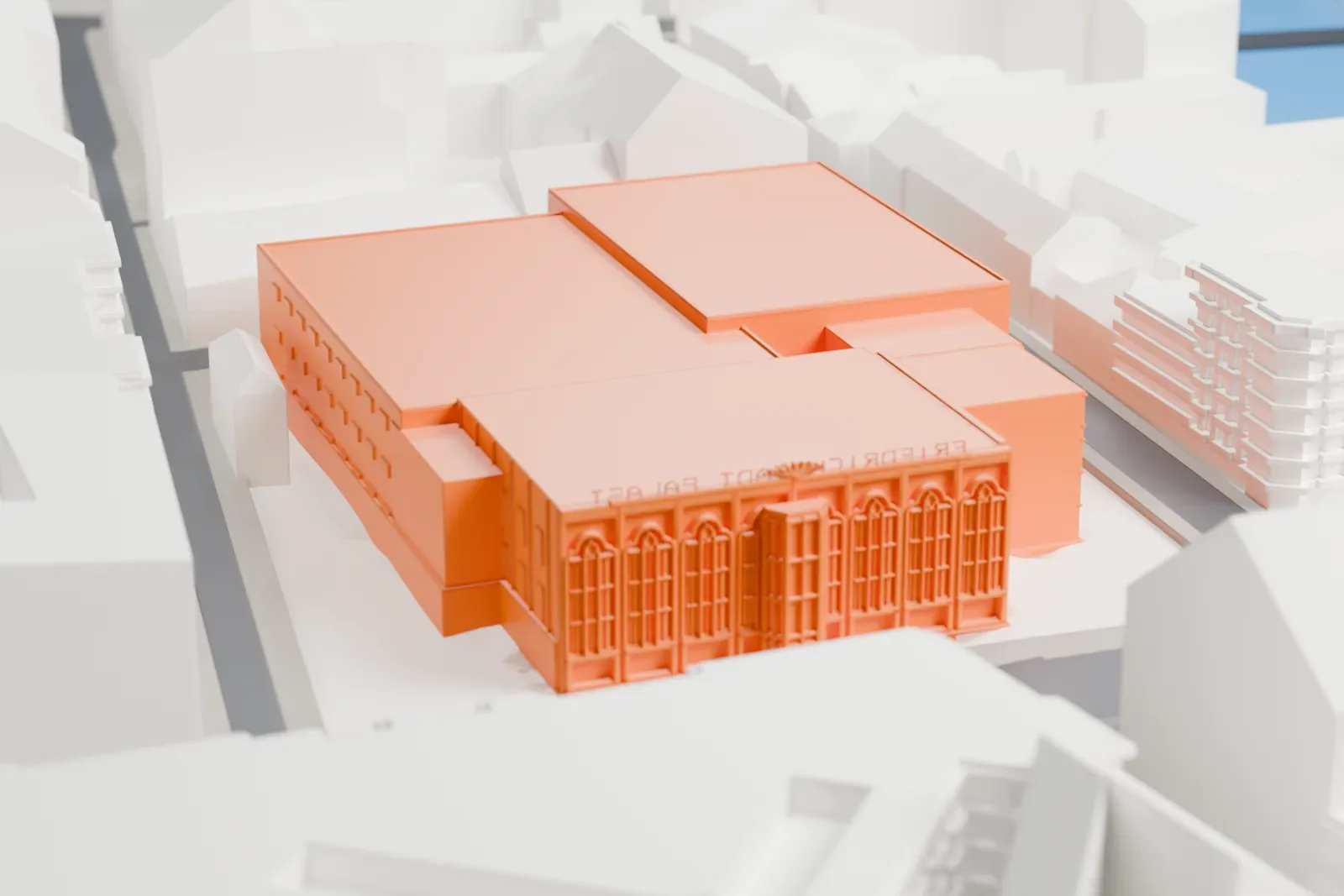 A white 3D print of the Friedrichstadt-Palast among the surrounding streets and buildings.
