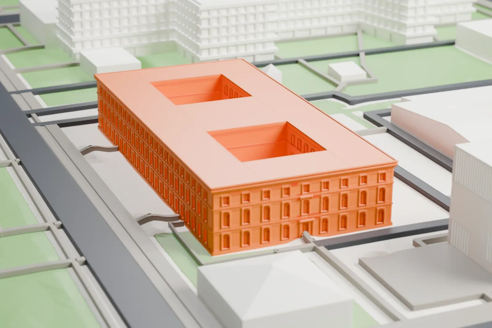 A white 3D print of the Führerbau in Munich, with the surrounding streets and buildings around it.