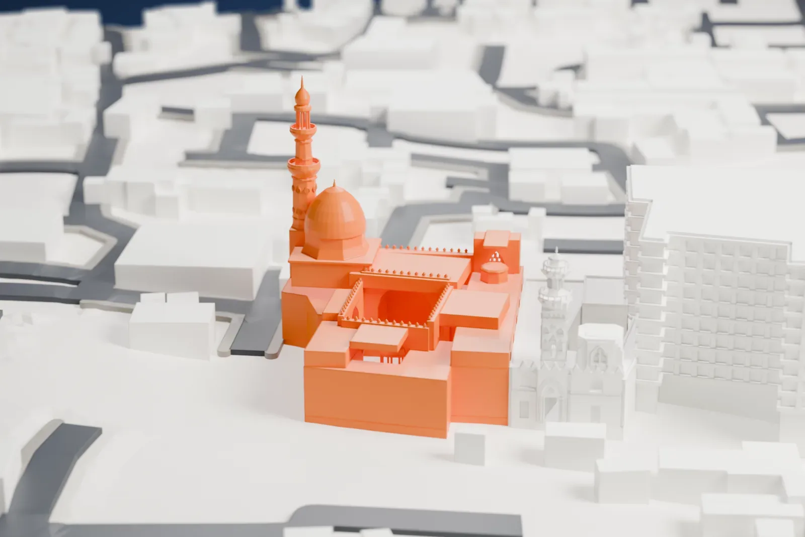 A white 3D print of the Funerary complex of Sultan Barquq among the surrounding streets and buildings.