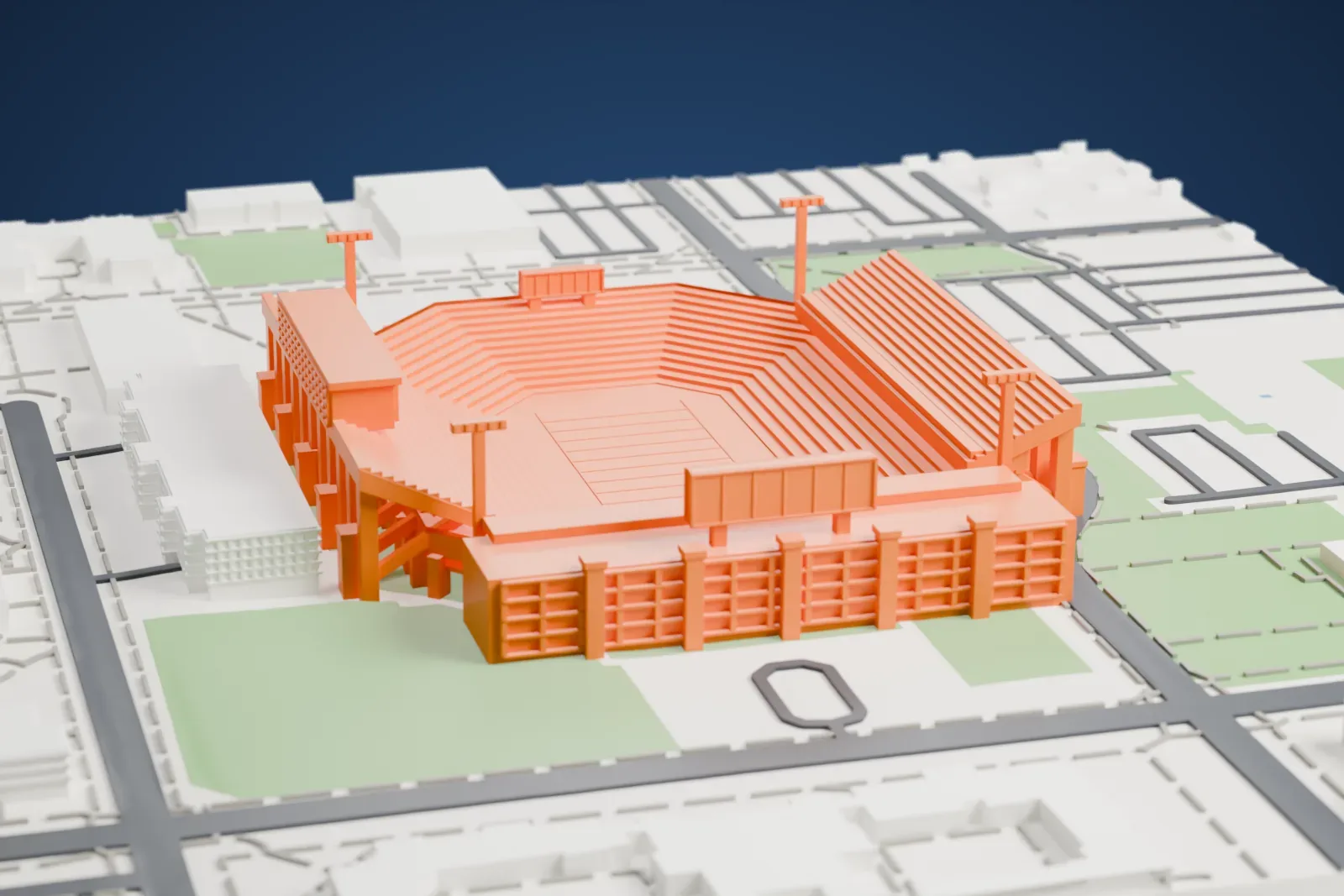 A white 3D print of Gaylord Family Oklahoma Memorial Stadium, a bowl-shaped stadium with stepped seating and rows of thin vertical ribs, surrounded by buildings, roads and green lawns.