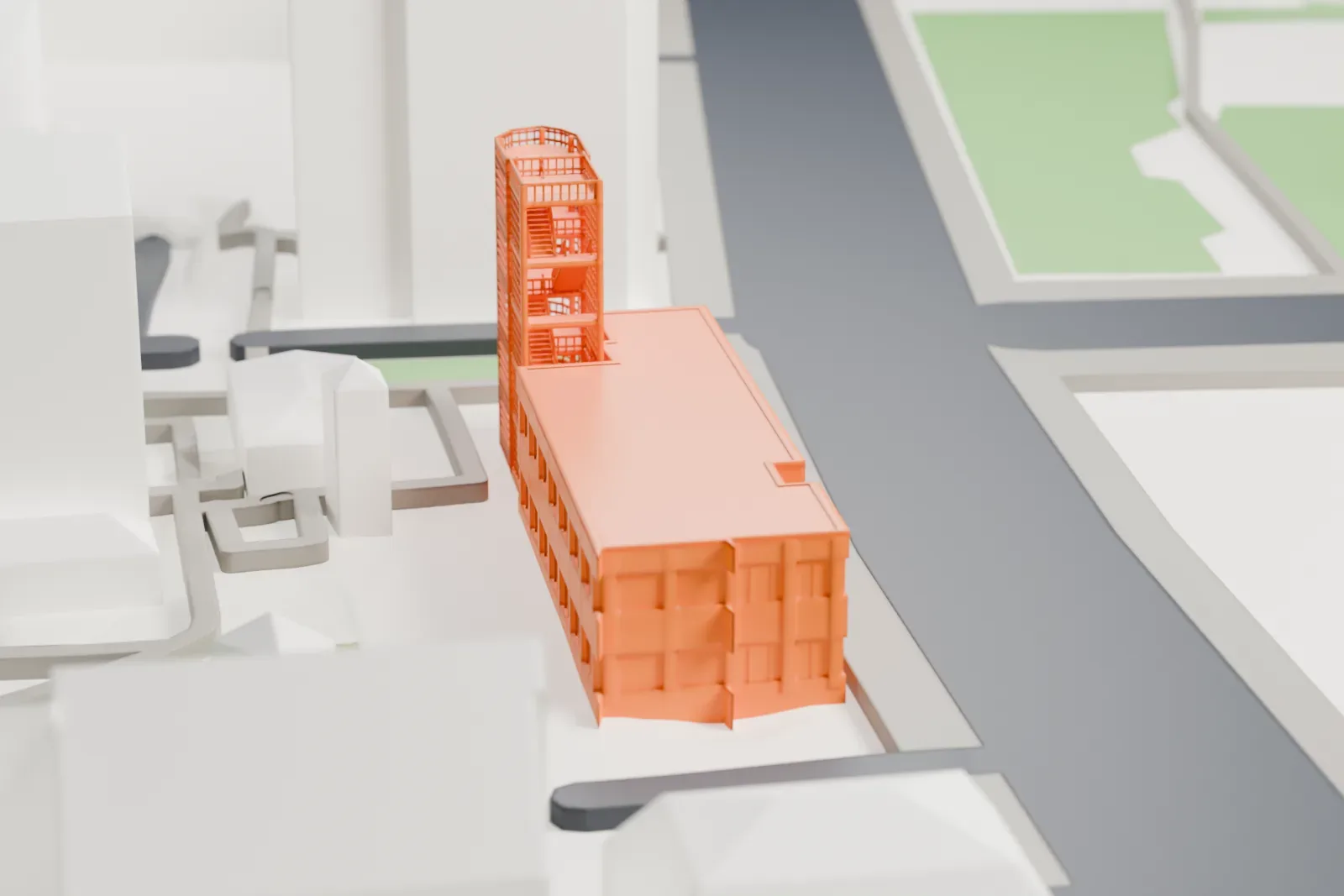 A white 3D print of the Gedenkstätte Berliner Mauer on Bernauer Straße, with its documentation center and the surrounding city buildings.
