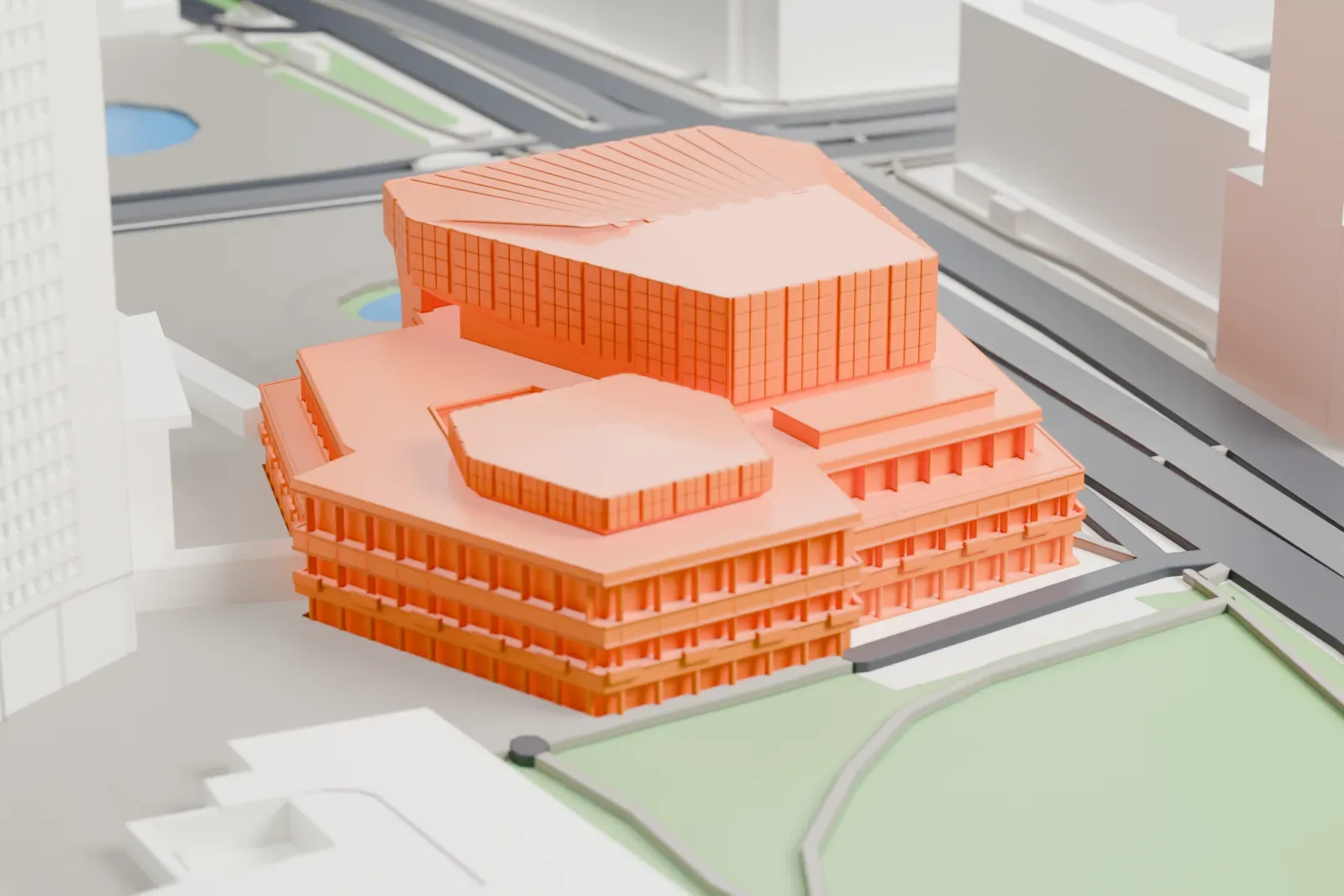 A white 3D print of the Gewandhaus Leipzig, a broad concert hall with a glazed front, among the surrounding streets and buildings of the city.