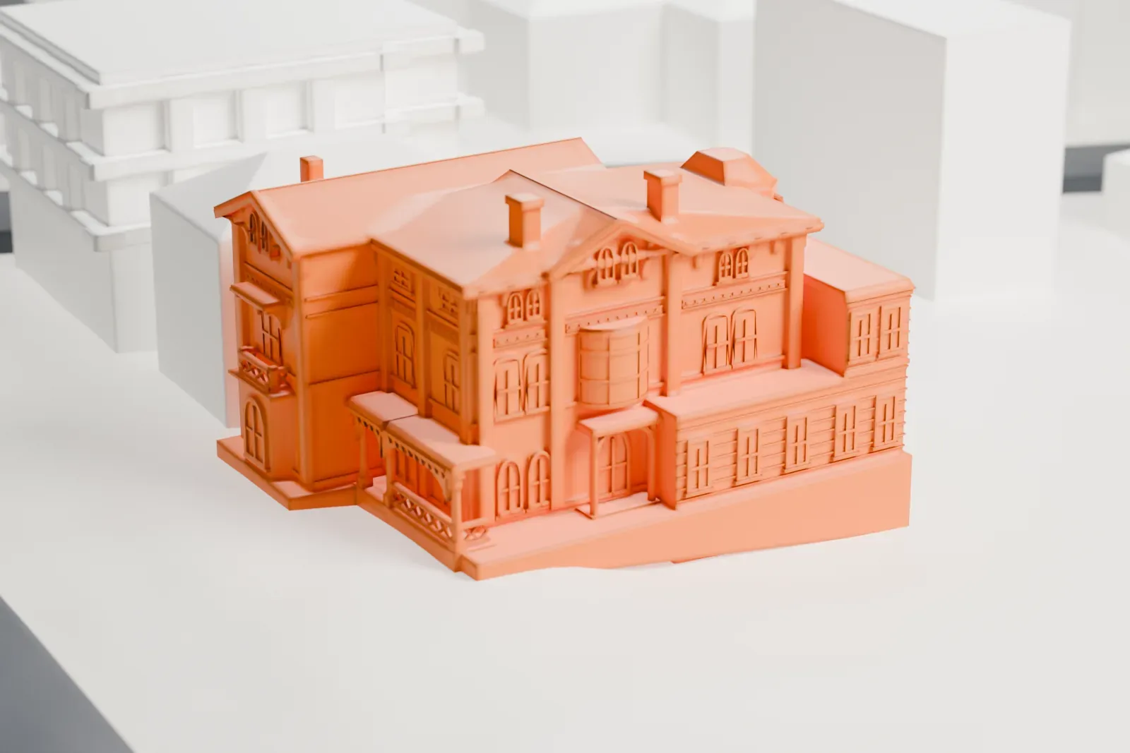 A white 3D print of Glencoe, a detailed mansion with a busy roofline, standing among surrounding buildings and streets.