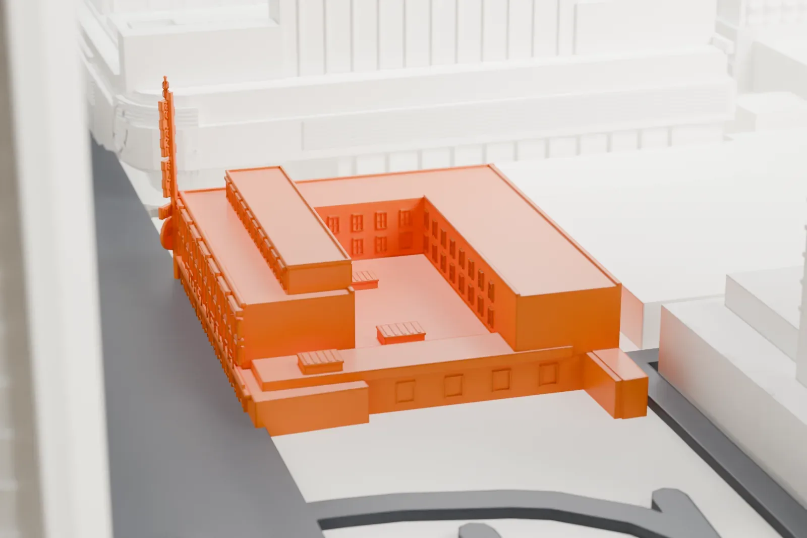 A white 3D print of the Golden Gate Hotel and Casino with stepped flat roofs and a vertical sign, set among streets and taller buildings.