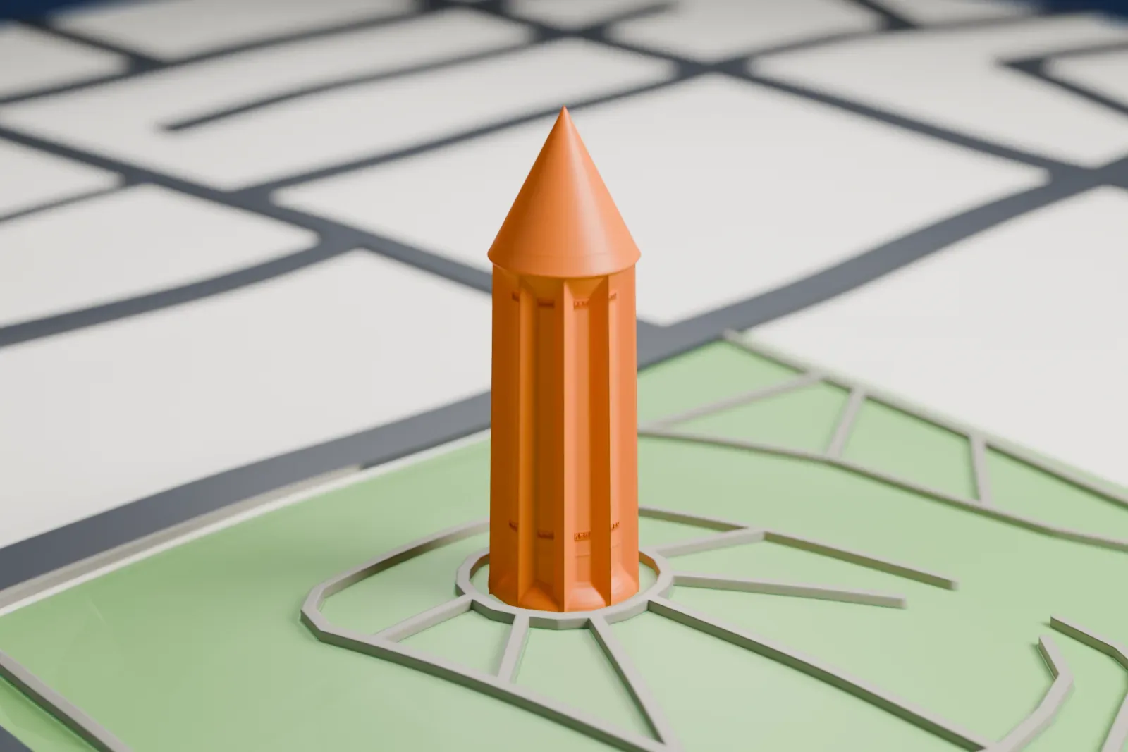 A white 3D print of the Gonbad-e Qabus tower, a tall cylindrical tower with vertical ribs and a conical roof, standing among surrounding streets and green space.
