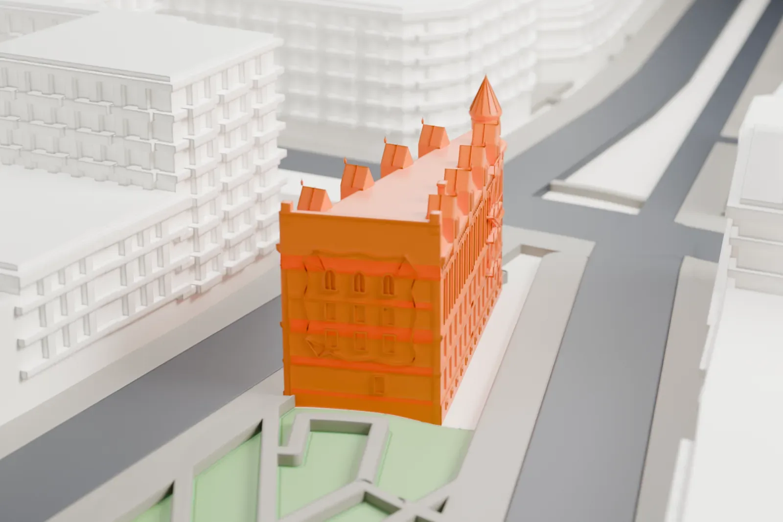 A white 3D print of the Gooderham Building, an office building in Toronto, set among the surrounding streets and buildings.