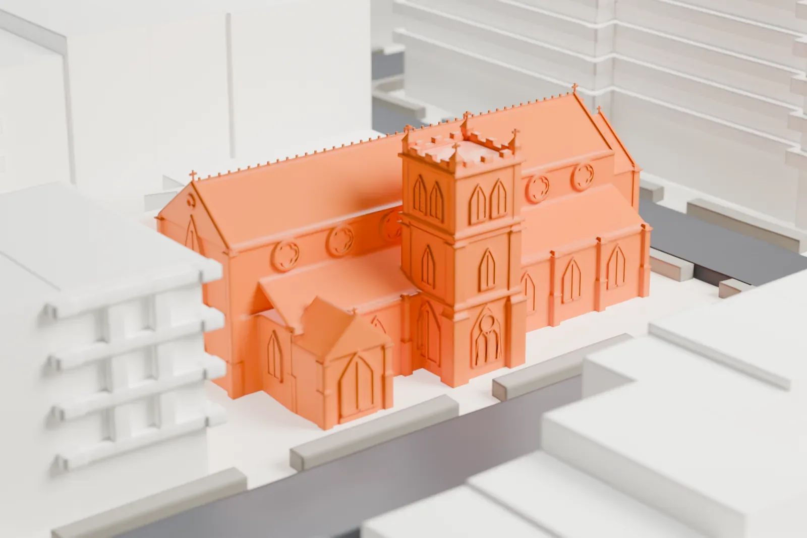 A white 3D print of Grace Church Van Vorst, a long church with a square crenellated tower, wedged between taller buildings beside a street.