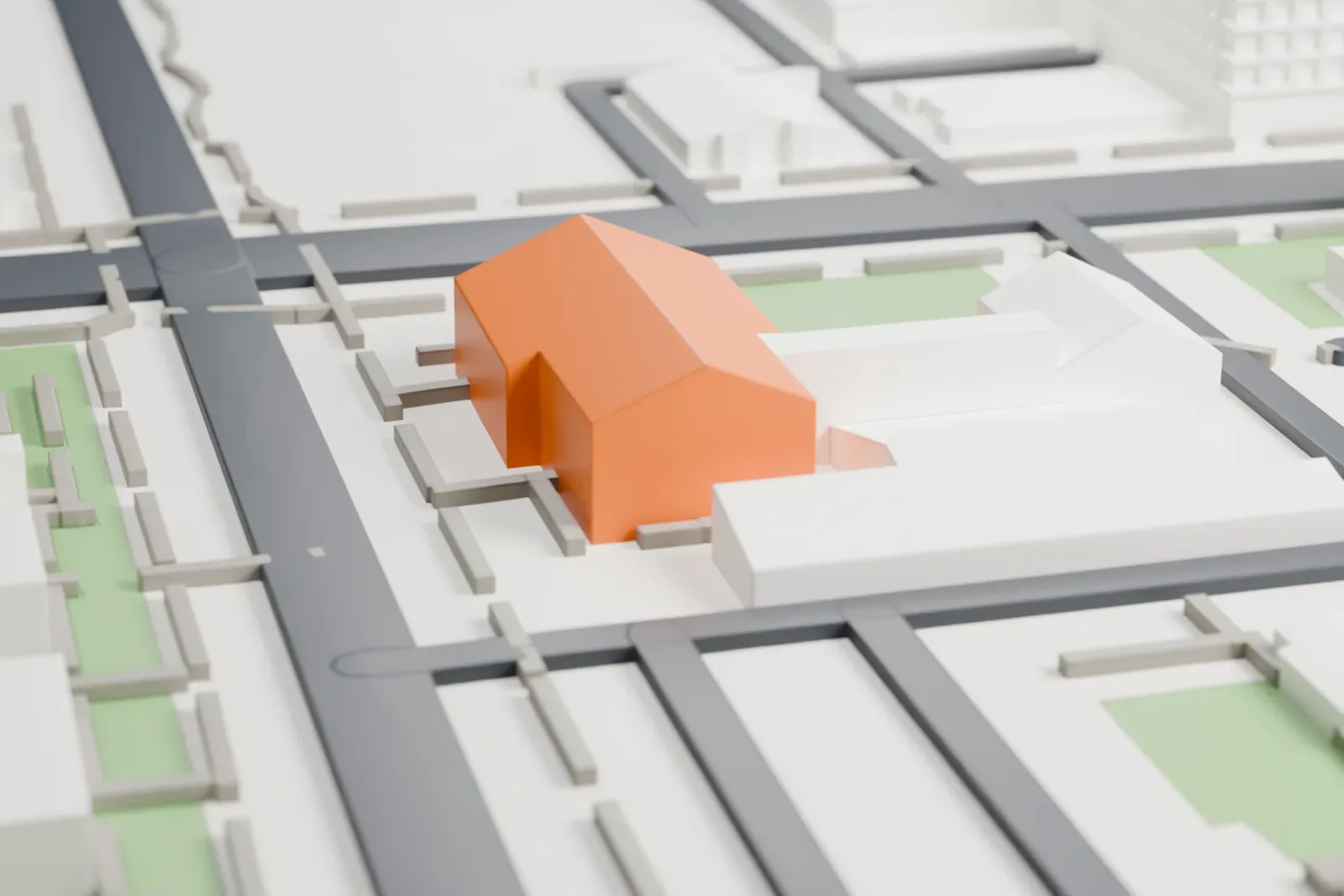 A white 3D print of Grace Lutheran Church, a stone church with a steep gabled roof and two front towers, set among streets, lawns and neighboring buildings.