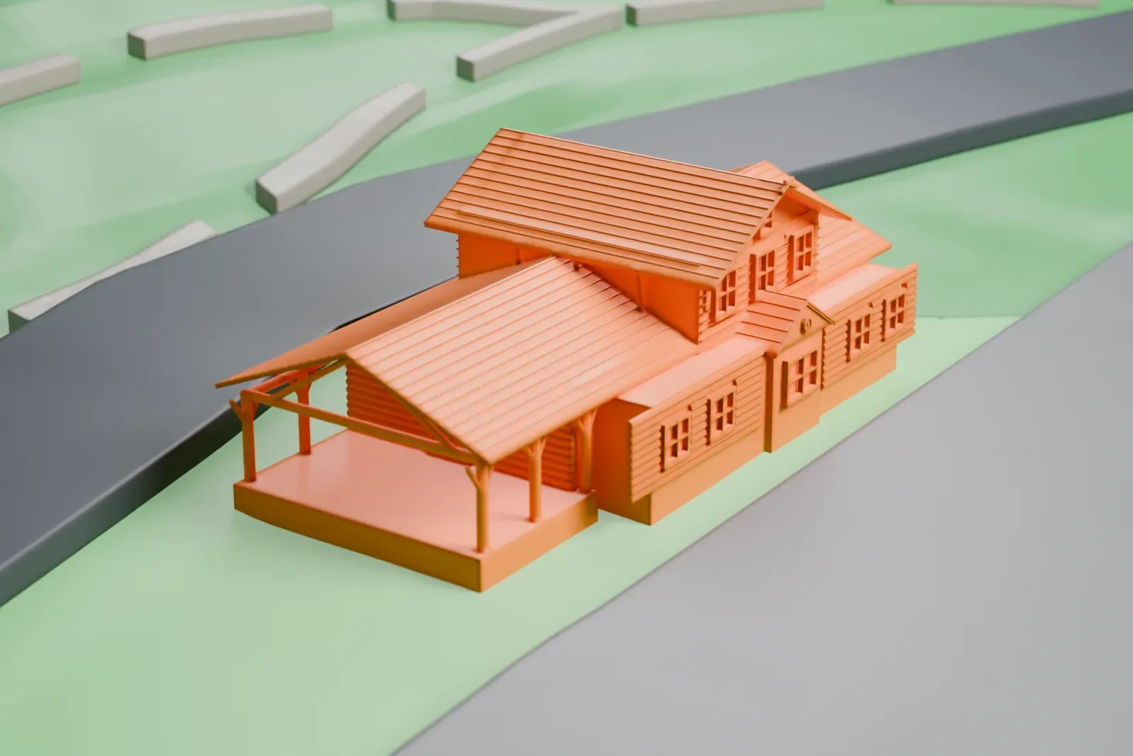 A white 3D print of the Grand Canyon Depot, a small log building with broad gabled roofs, an upper story that overhangs the first and a porch on thin posts, set on grassy ground beside wide paved areas.