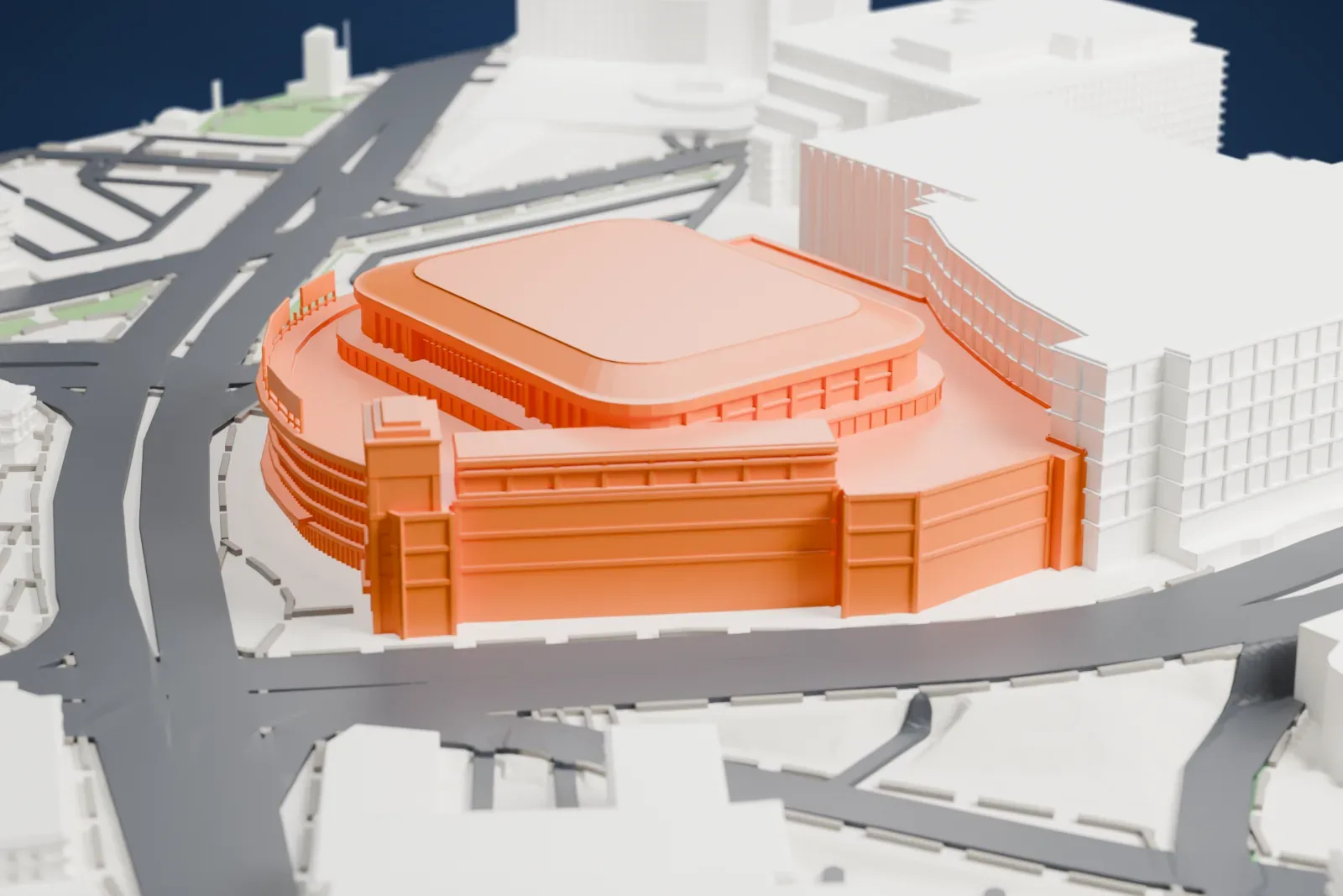 A white 3D print of Grand Casino Arena, its curved front, corner tower and low crowned bowl roof standing among the surrounding streets and buildings.