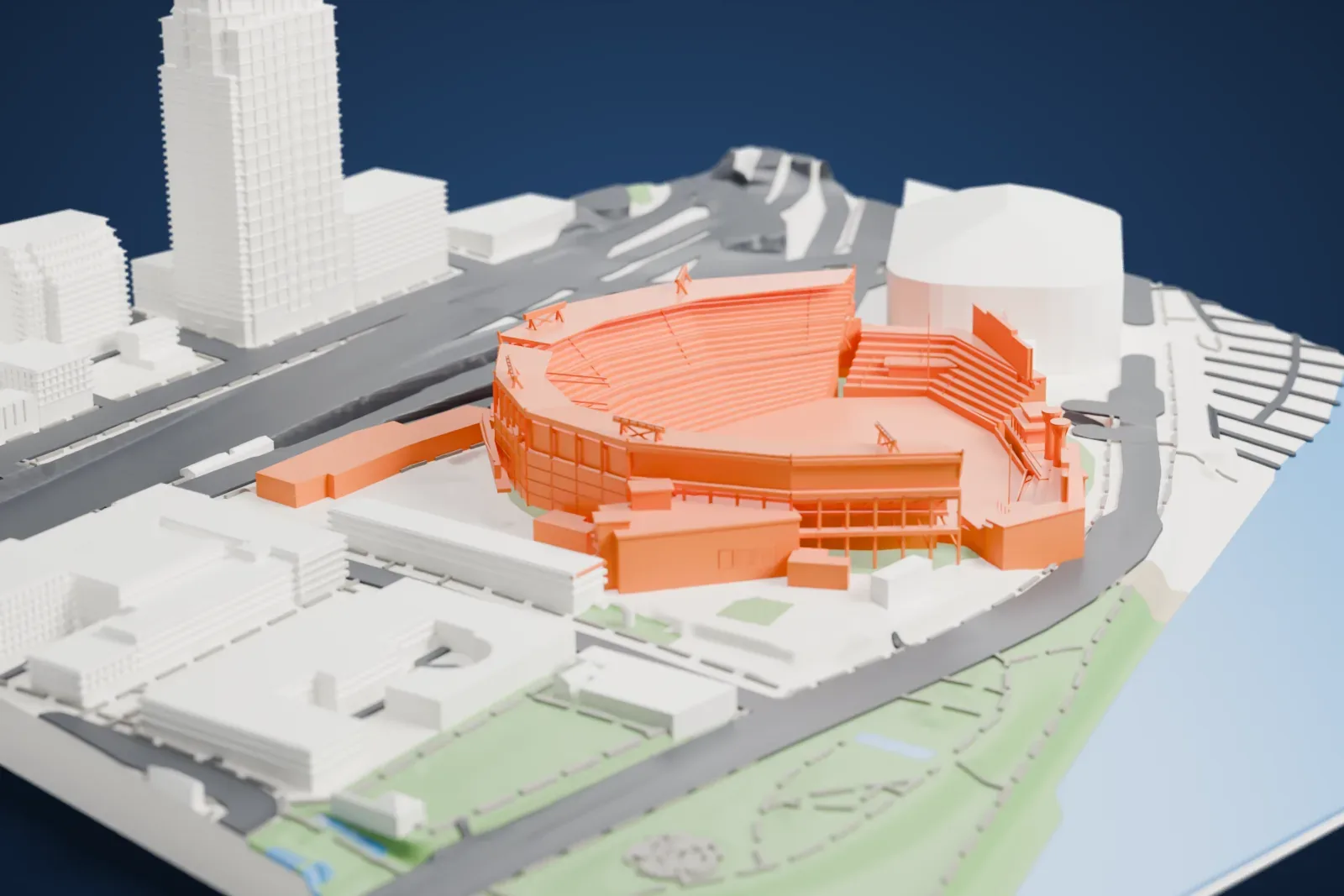 A white 3D print of Great American Ball Park, a baseball stadium with curved tiered stands and angled canopy beams, beside roads, buildings and a stretch of water.