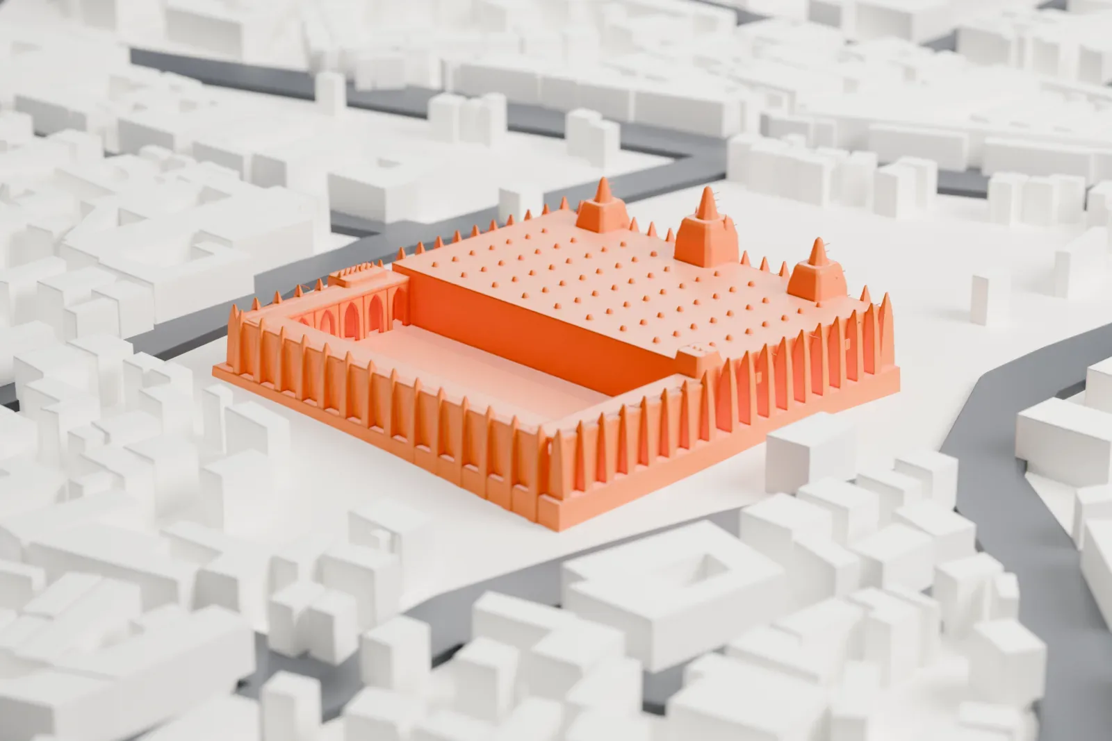 A white 3D print of the Great Mosque of Djenné, a wide, low building with three cone-topped towers along one wall and rows of small pinnacles, standing in an open square among boxy buildings.