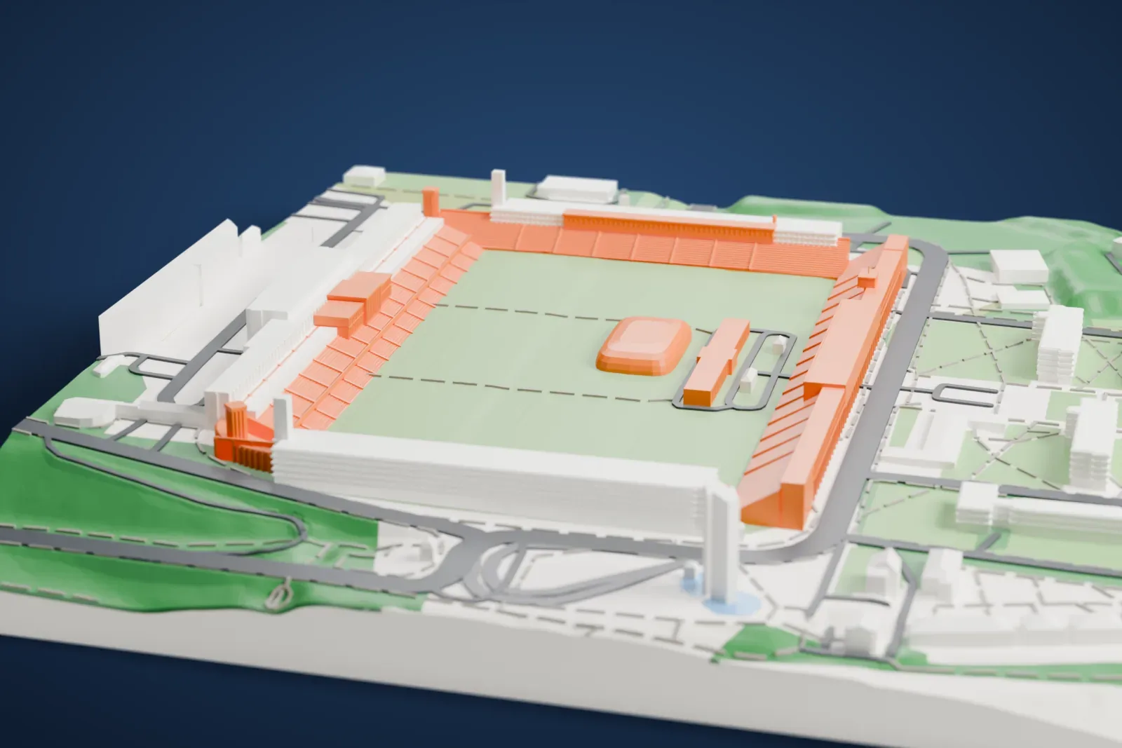 A white 3D print of Great Strahov Stadium, a huge open bowl of stepped terraces around a wide field, with the surrounding streets and buildings.