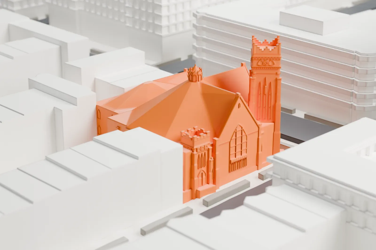 A white 3D print of Greenwood Baptist Church, a Gothic-style church with a tall corner tower and steep multi-faceted roofs, packed in among taller buildings on a city block.