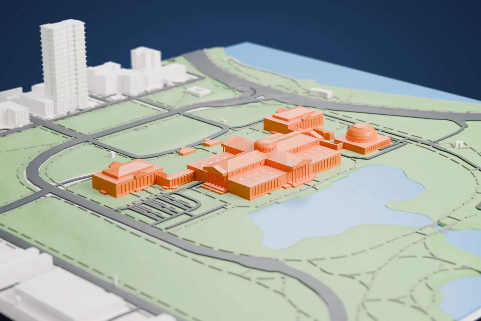 A white 3D print of the Griffin Museum of Science and Industry, a large columned building with a central dome and four projecting wings, with smaller pavilions and a domed hall beside it, on parkland next to a lagoon.
