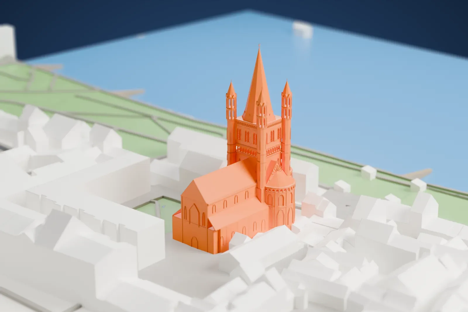 A white 3D print of the Great St. Martin Church, among the surrounding streets and buildings.