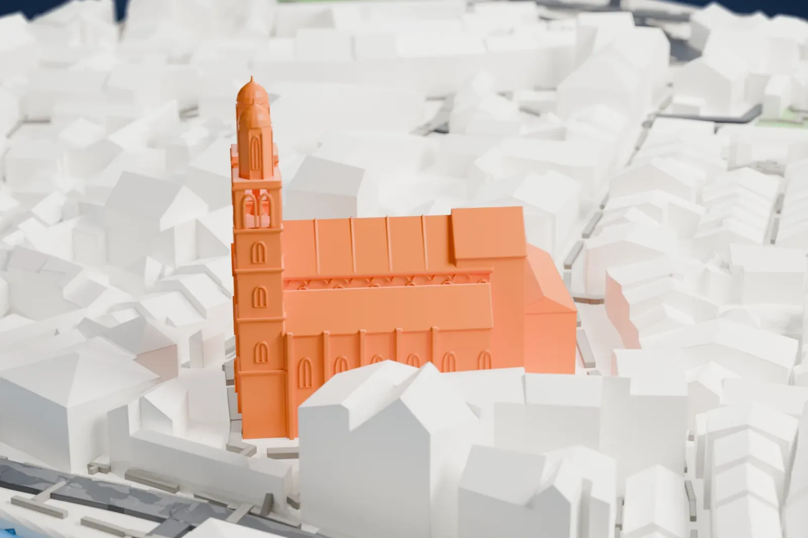 A white 3D print of the Grossmünster, a church with two slender towers topped by domes, a long roofed nave and a cloister wing, packed among dense buildings beside a river.
