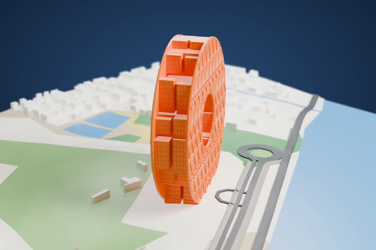 A white 3D print of Guangzhou Circle, a circular tower with an open center, on the bank of the Pearl River among the surrounding city.