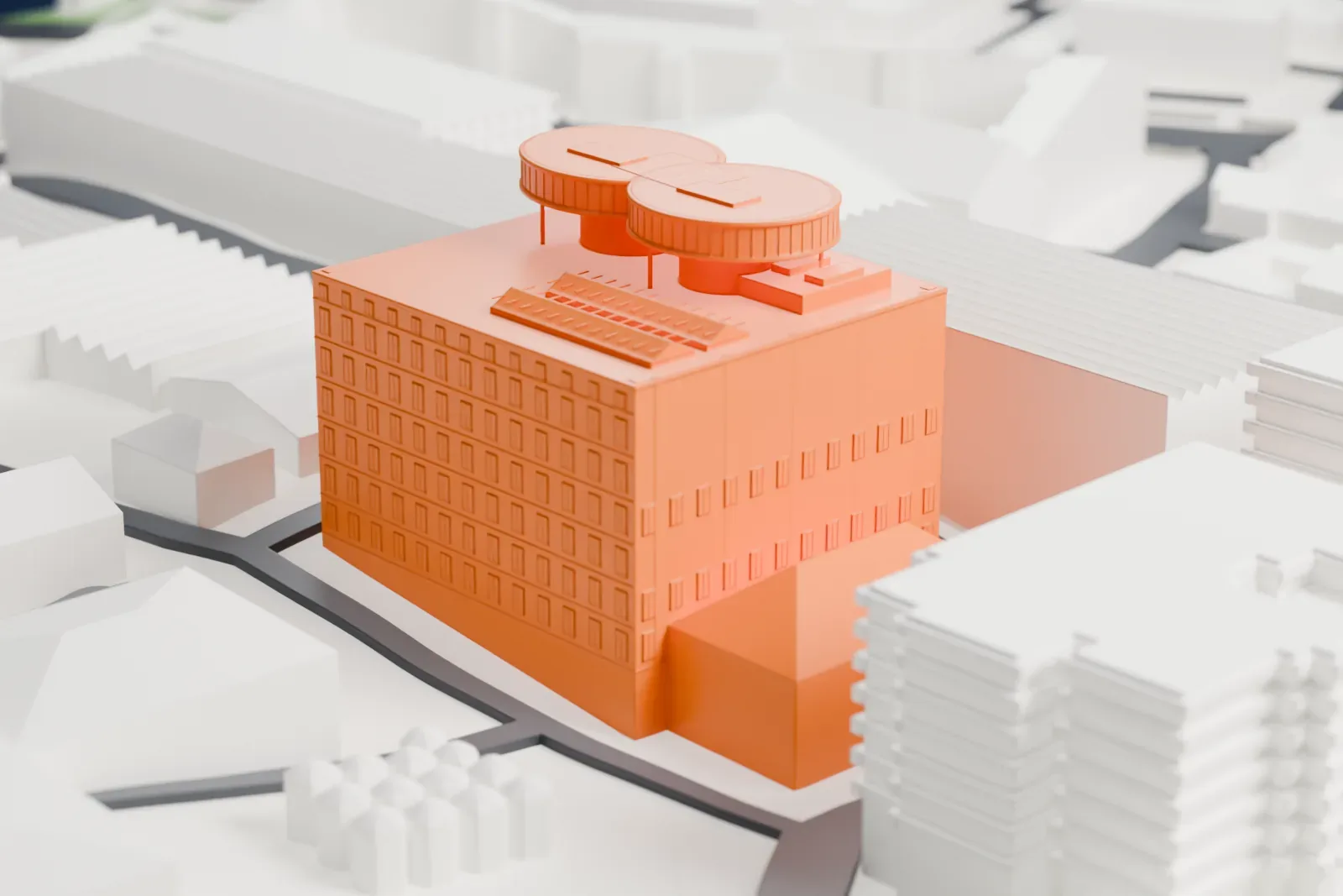 A white 3D print of the Guinness Storehouse, a tall boxy block with two overlapping round decks on its roof, surrounded by buildings, small silos and streets.