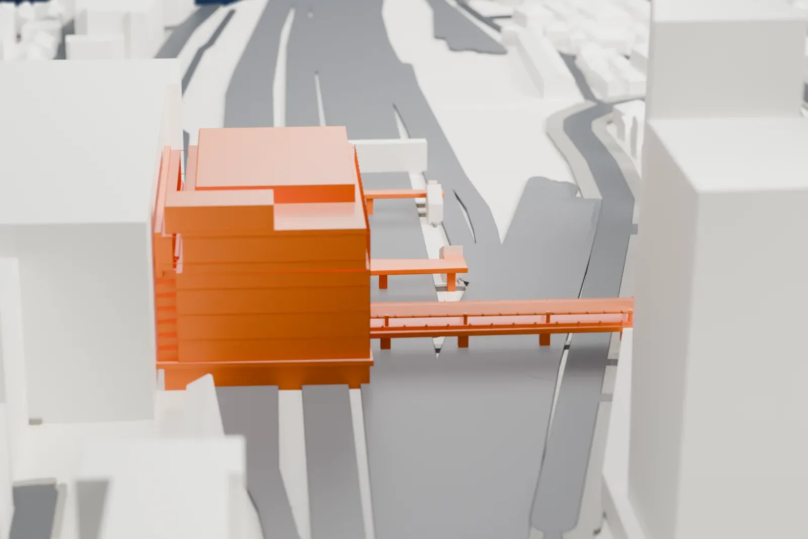 A white 3D print of Hachiōji Station, a long station building with an elevated structure above its platforms, among the surrounding streets and buildings of the city.