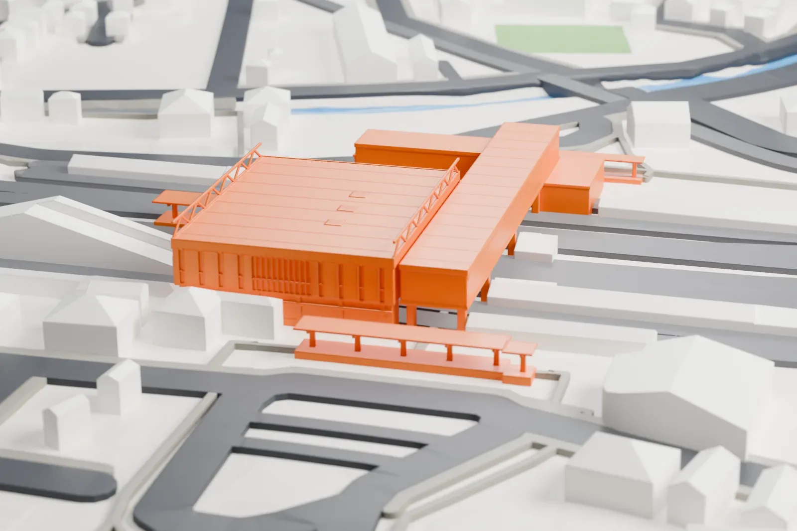 A white 3D print of Haijima Station among the surrounding streets and buildings.