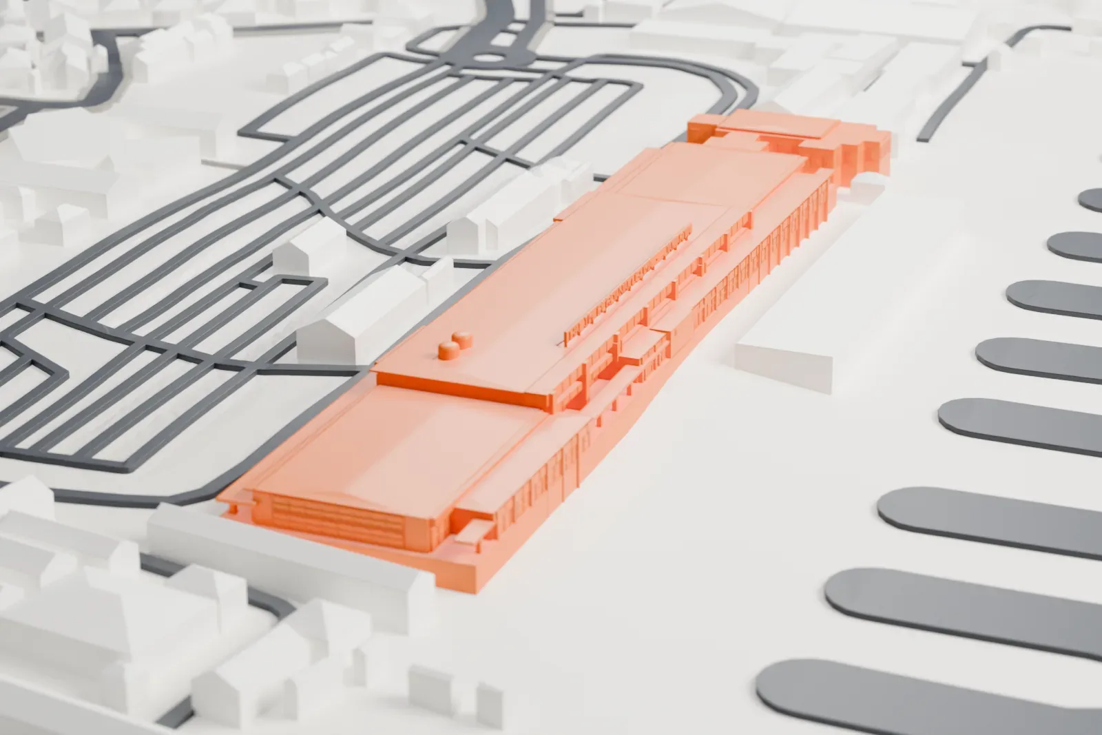 A white 3D print of the Halim Perdanakusuma Airport main terminal, with the surrounding streets and buildings around it.