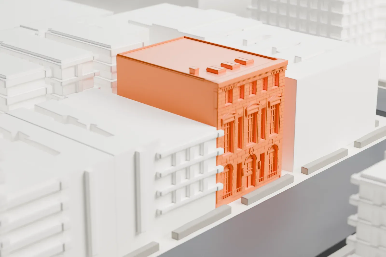 A white 3D print of the Hamilton Grange Library, a three-story building with an arched, textured front and rooftop boxes, standing among taller and lower buildings on a city block.