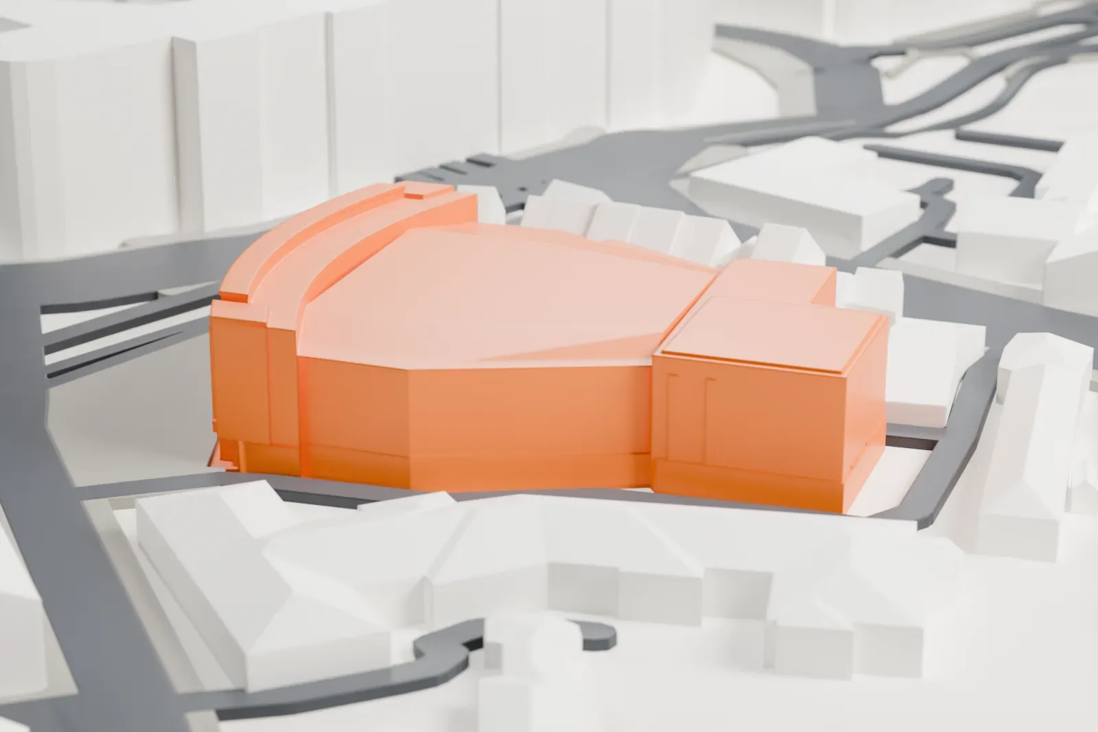 A white 3D print of Hammersmith Apollo, a low block of a building, among the streets and buildings of its London neighborhood.