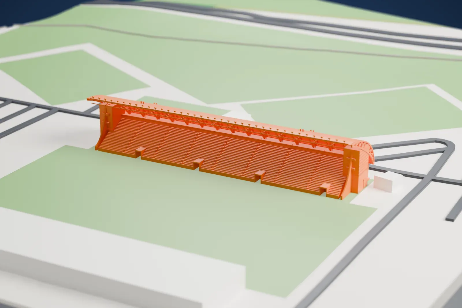 A white 3D print of the HaMoshava Stadium, a long stand with a curved roof on a row of slim columns, among surrounding roads.