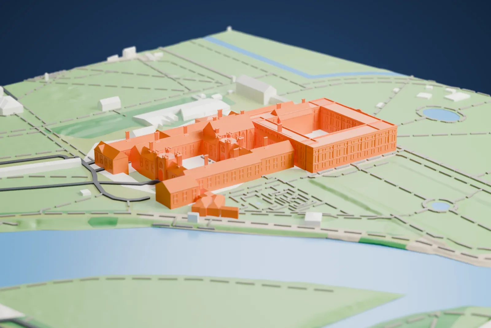 A white 3D print of Hampton Court Palace, a sprawling complex of low brick wings around courtyards with clustered chimneys, set in green parkland beside a bend of the River Thames.