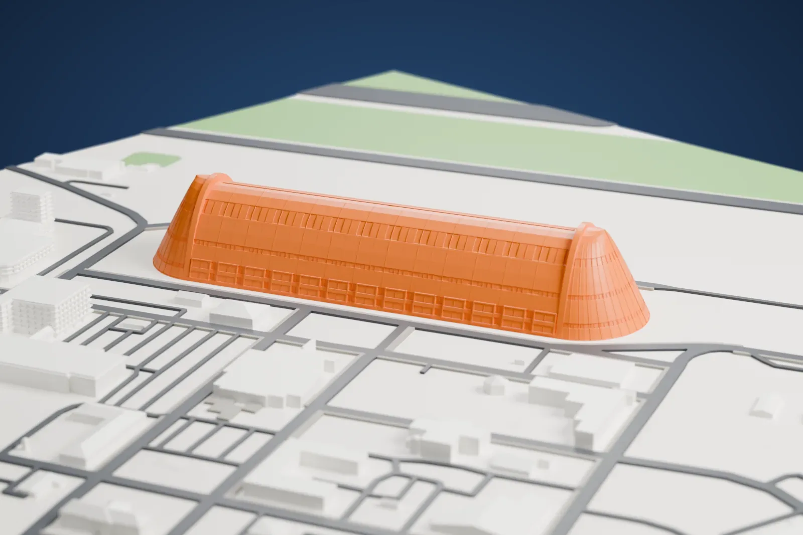 A white 3D print of Hangar One among the surrounding streets and buildings.