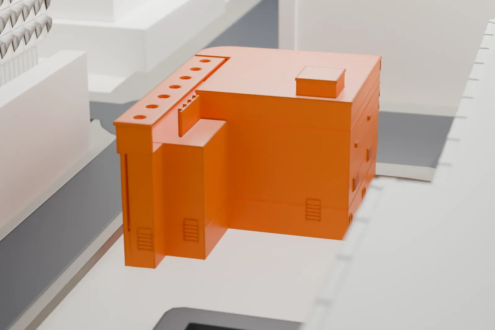A white 3D print of Hanny's, a low corner building among surrounding streets and buildings.