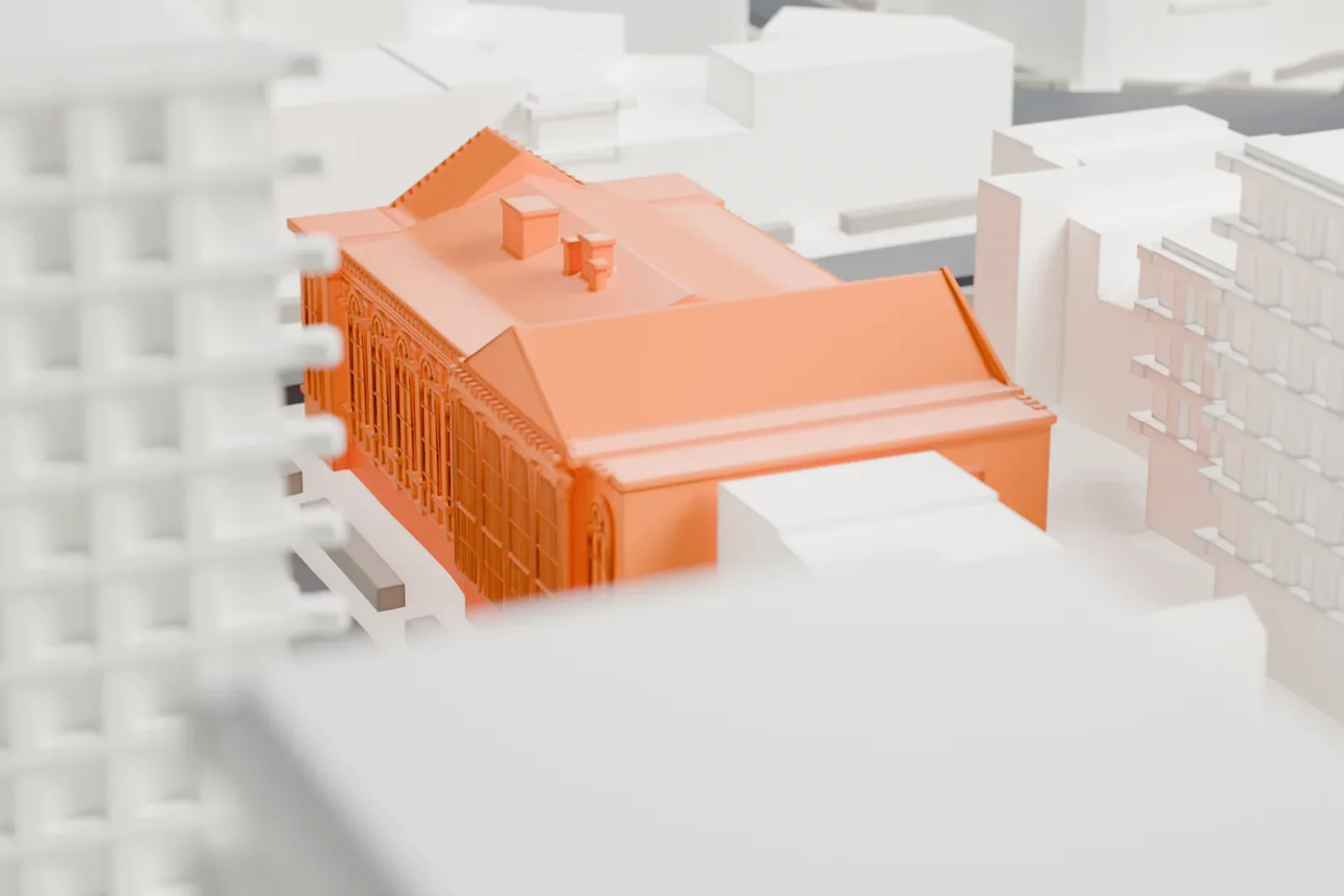 A white 3D print of the Hanson Place Seventh-day Adventist Church, a large building with a columned entrance and a pedimented front, on a block among taller buildings and streets.