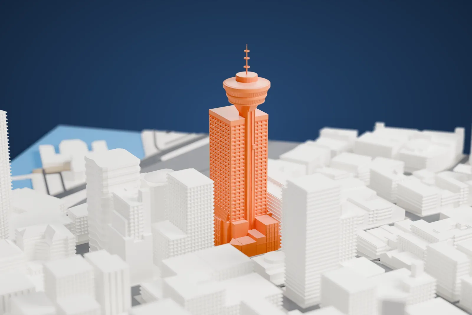 A white 3D print of Harbour Centre, a square concrete office tower with a two-tier saucer-shaped observation deck and a thin mast above it, among surrounding city buildings.