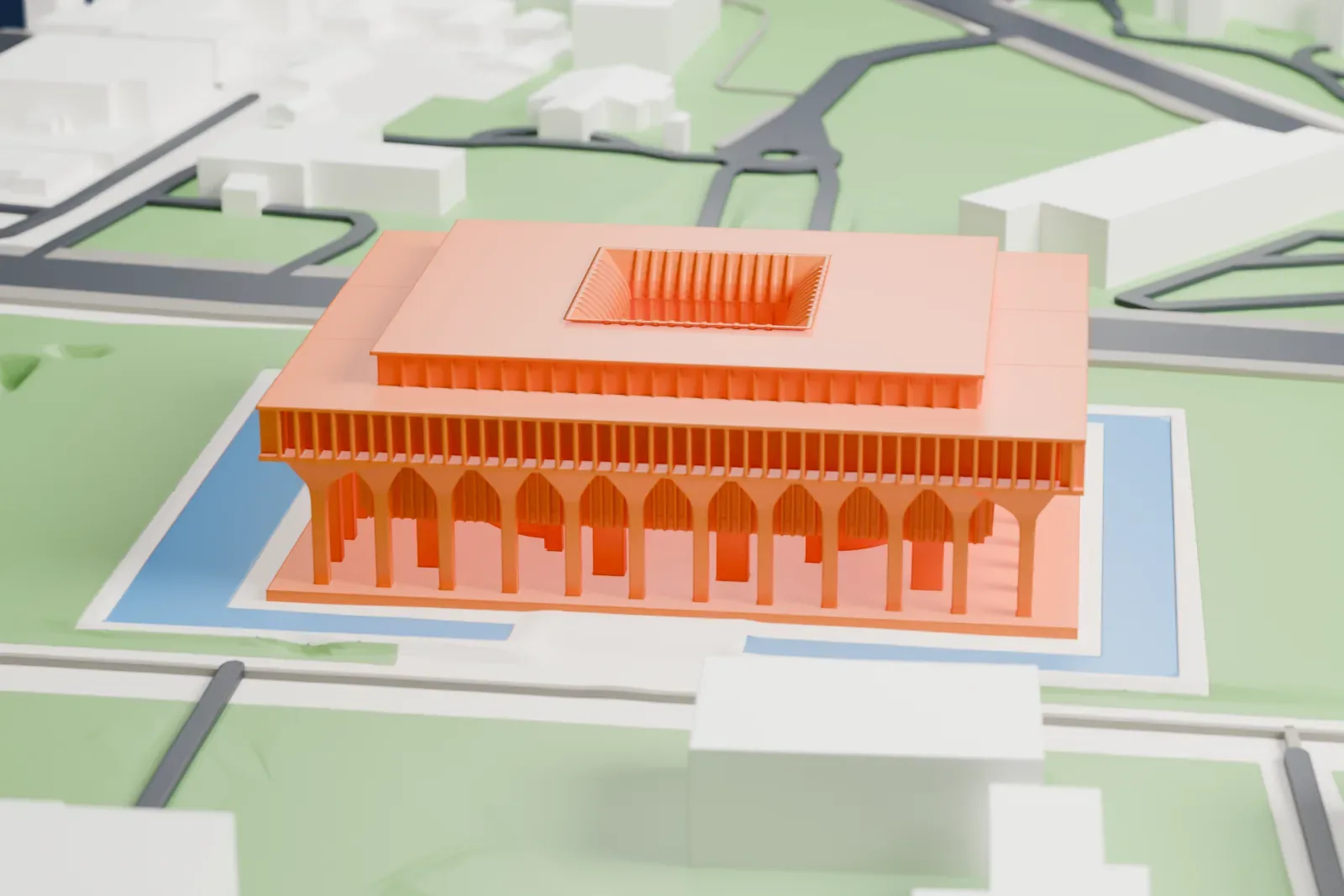 A white 3D print of the Hawaii State Capitol among the surrounding streets and buildings of downtown Honolulu.
