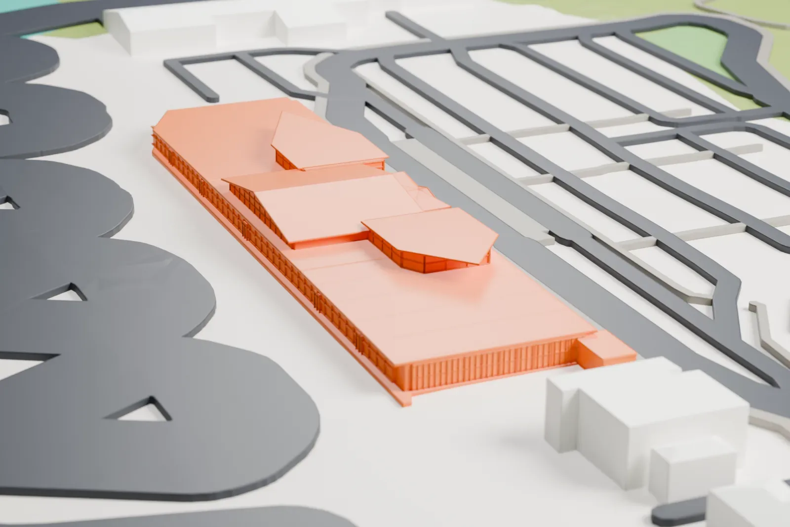 A white 3D print of the Hawke's Bay Airport Terminal, a long low terminal with arrowhead roof projections, among airport buildings.