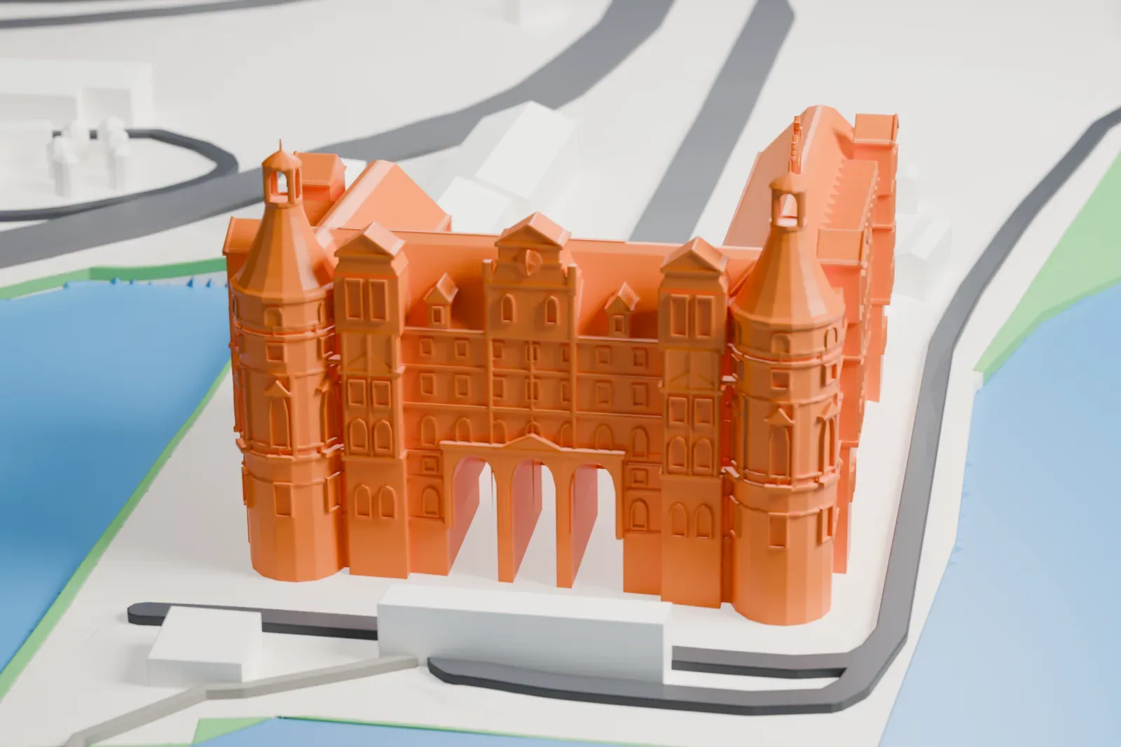 A white 3D print of Haydarpaşa railway station, a long station building, among the surrounding streets and buildings.