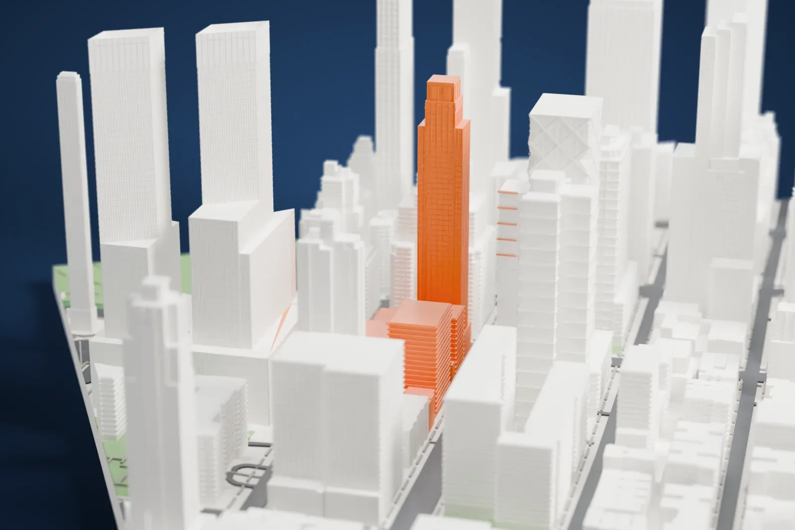 A white 3D print of the Hearst Tower, a slender skyscraper wrapped in a diagonal grid, standing among closely packed towers of Midtown Manhattan.