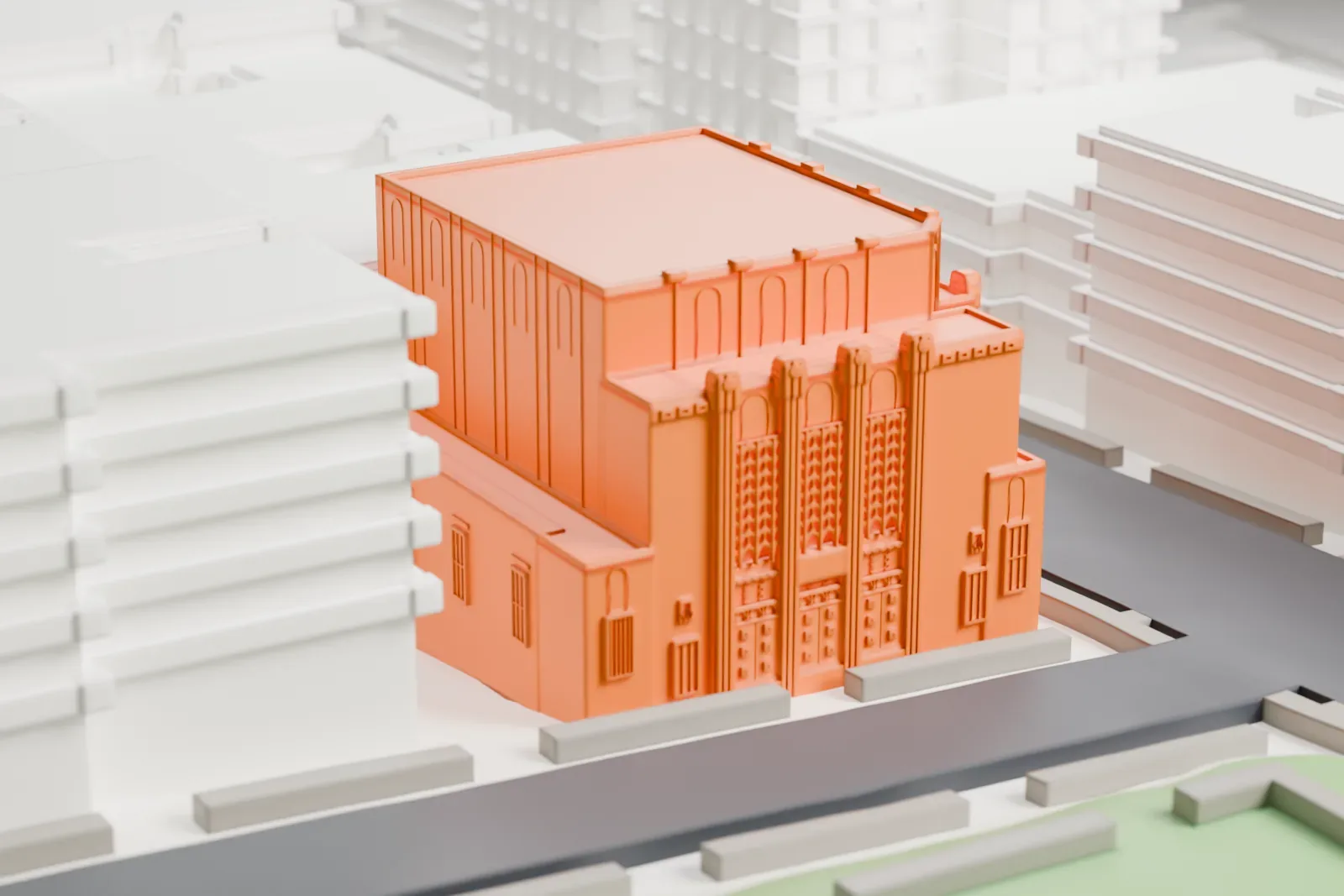 A white 3D print of the Hebrew Tabernacle of Washington Heights, a large stepped building with tall window bays, beside a park and low buildings.