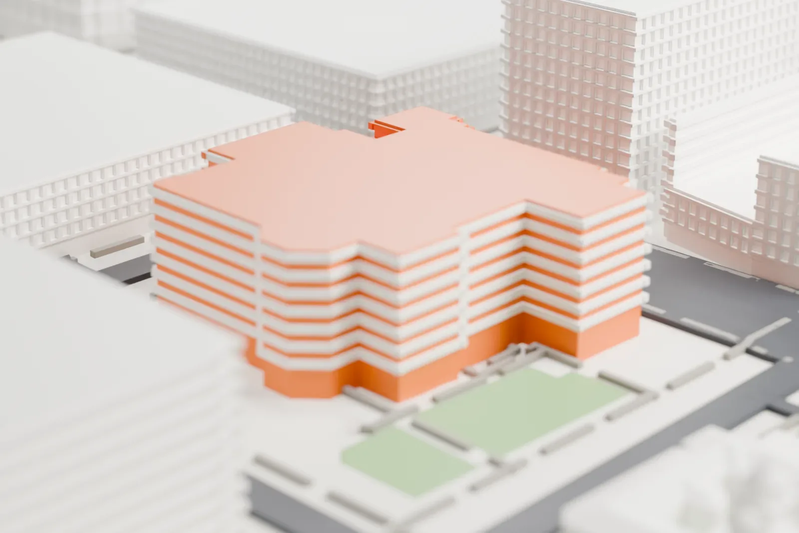 A white 3D print of the Herberger Theater Center, a cluster of curved drum-shaped halls and taller rectangular stage blocks with a faceted entrance, among downtown streets.