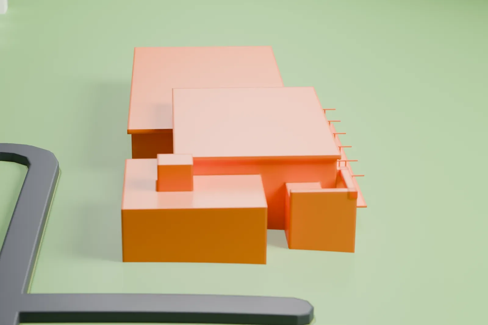 A white 3D print of the Highlands National Motorsport Museum, a long low building with a smaller block beside it, on open grassy ground with a looping road nearby.