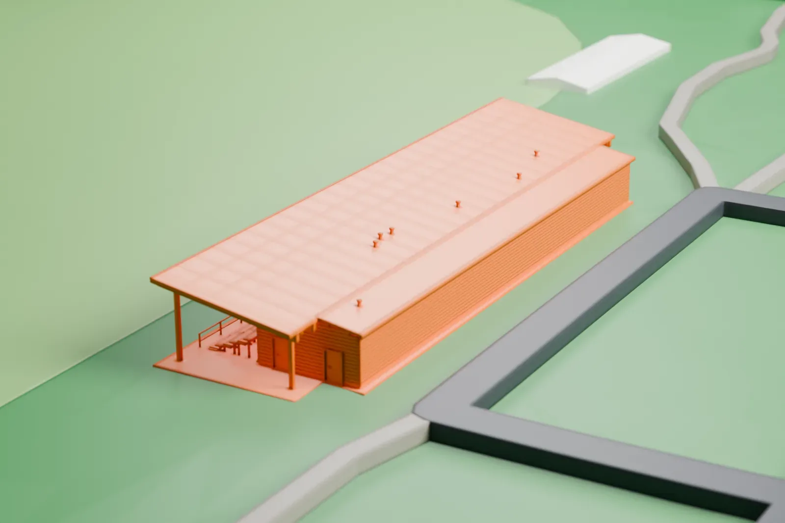 A white 3D print of Hiiu Stadium, a small covered grandstand with a flat roof on slim posts beside a green pitch, with a road and buildings nearby.